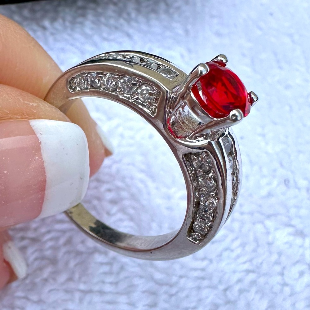 Swarovski silvertone ring with ruby red & clear cubic zirconia crystals. Size 9.